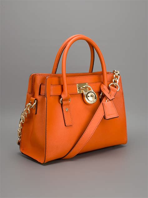 orange leather michael kors purse|Michael Kors orange handbag.